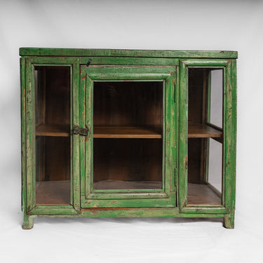 Glass-fronted 3 panel green wooden cabinet