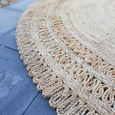 handwoven round jute rug