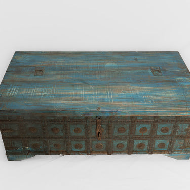 Blue low trunk with metal floral detailing