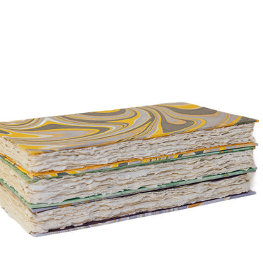 Florentine-style marbled book with hand torn paper