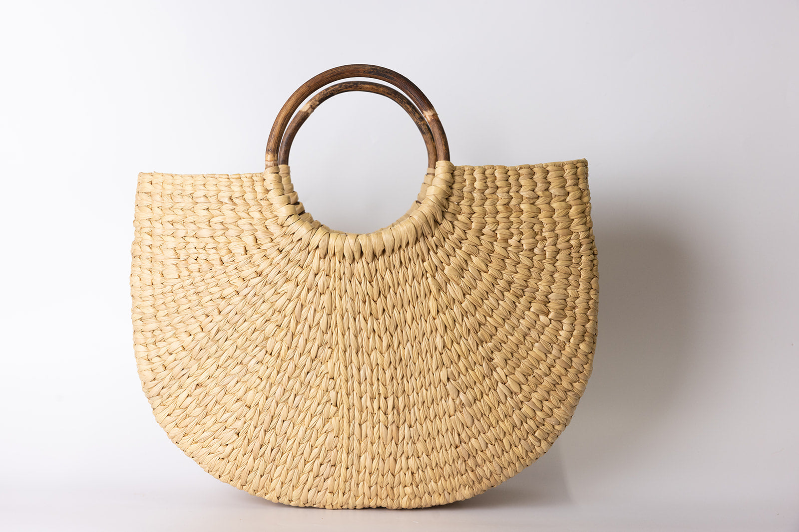 Sea grass bag with cane handle โ MerchantCampbell