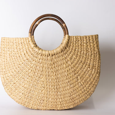 seagrass bag with cane handle