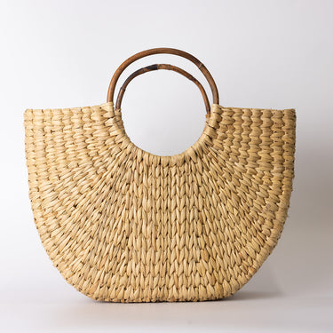 seagrass bag with cane handle