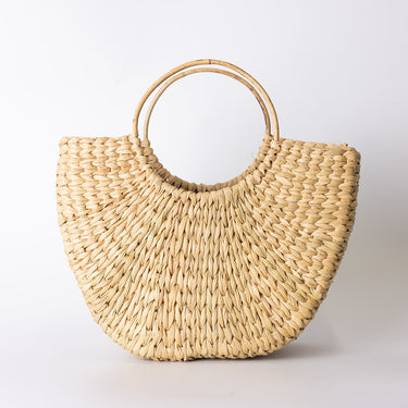 Sea grass bag with cane handle