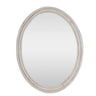 Round mirror with a beige frame on a white background