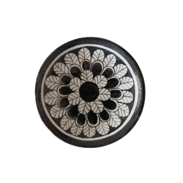 Ceramic bowl with black floral pattern 