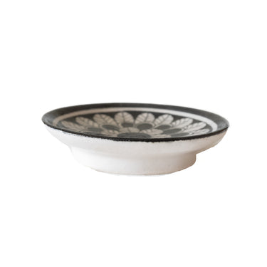 Ceramic bowl with black floral pattern 