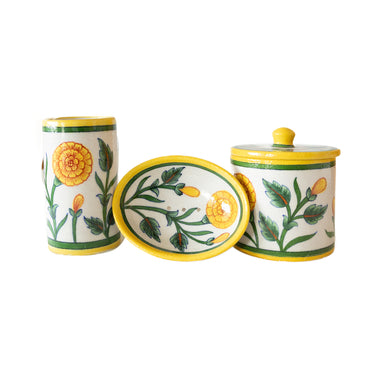 Set of three ceramic bathroom accessories with  yellow floral designs 