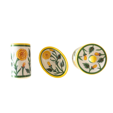 Set of three ceramic bathroom accessories with  yellow floral designs 