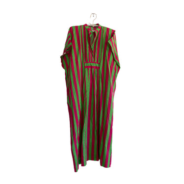 A long kaftan dress with vertical stripes in green and magenta pink,