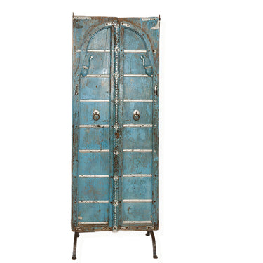 Pair of blue doors on stand