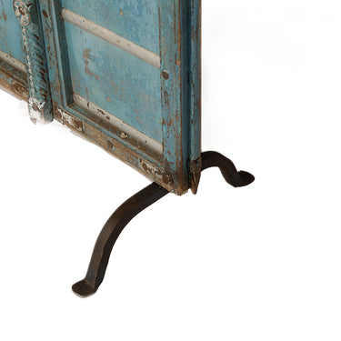 Pair of blue doors on stand