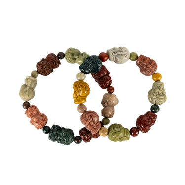 Multicolored beaded bracelet with various carved Buddha beads 