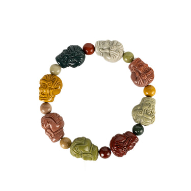 Multicolored beaded bracelet with various carved Buddha beads 