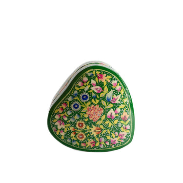 Decorative heart-shaped object with floral patterns