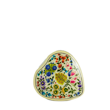 Decorative heart-shaped object with floral patterns