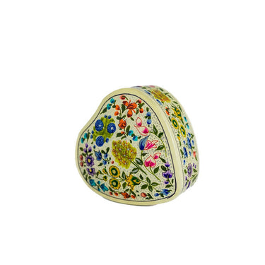 Decorative heart-shaped object with floral patterns