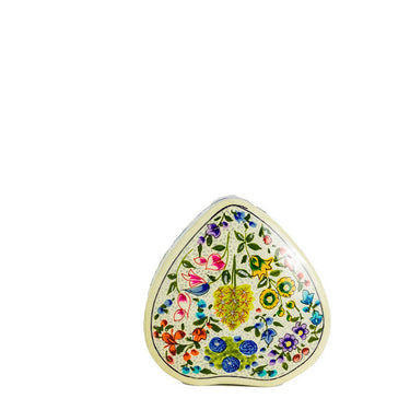 Decorative heart-shaped object with floral patterns