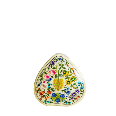 Decorative heart-shaped object with floral patterns
