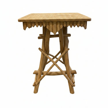 A brown wooden bedside  table with a scalloped apron and crossed legs, 