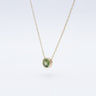 gold Necklace with a peridot gemstone pendant 