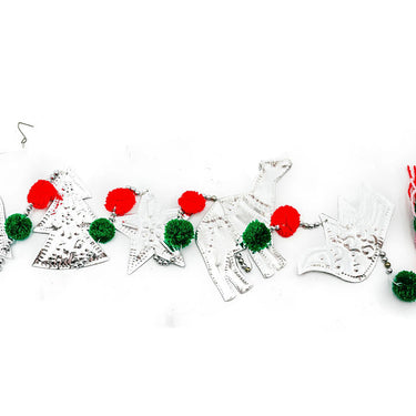 hanging pressed metal Christmas symbols with pompoms