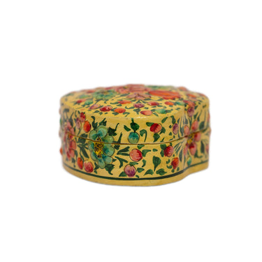 Decorative heart-shaped box with floral patterns