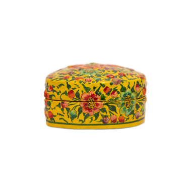 Decorative heart-shaped box with floral patterns