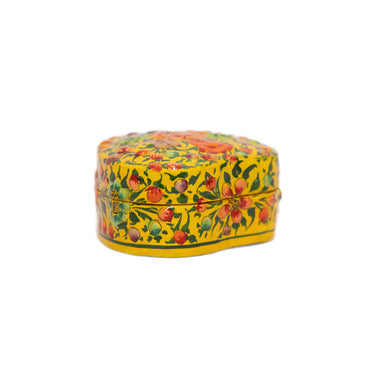 Decorative heart-shaped object with floral patterns