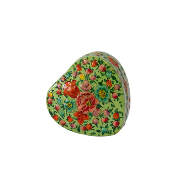 Decorative heart-shaped box with floral patterns