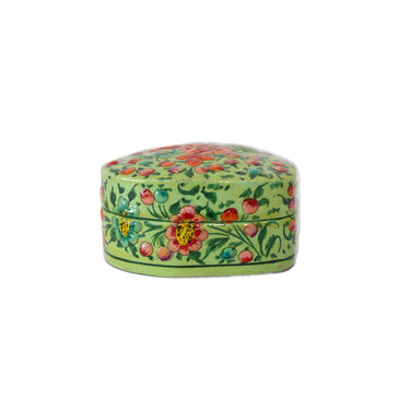 Decorative heart-shaped object with floral patterns
