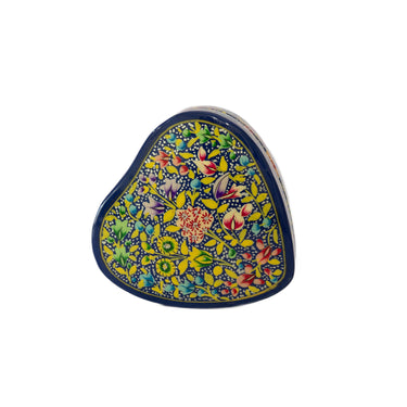 Decorative heart-shaped box with floral patterns