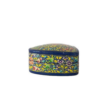 Decorative heart-shaped object with floral patterns