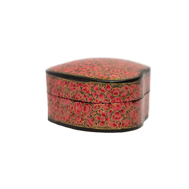 Decorative heart-shaped box with floral patterns