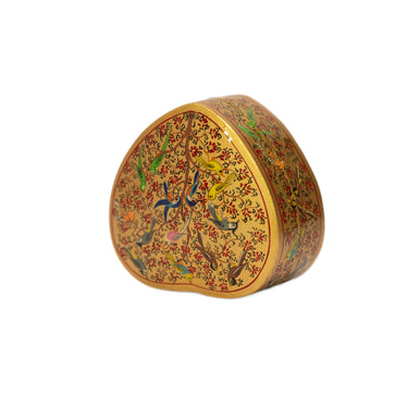 Decorative heart-shaped box with floral patterns