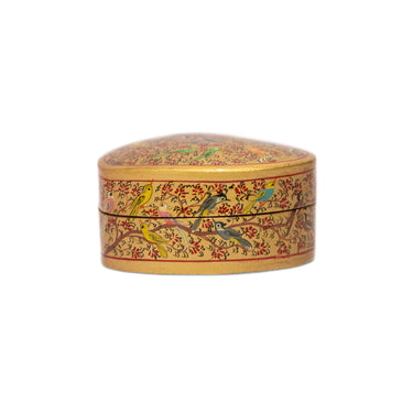 Decorative heart-shaped box with floral patterns
