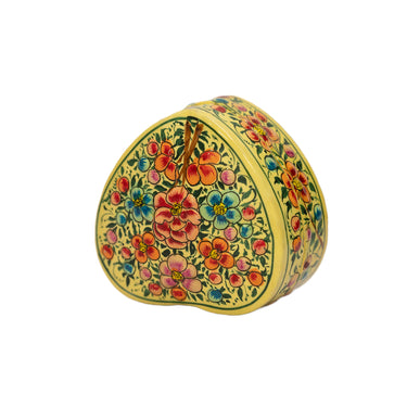 Decorative heart-shaped box with floral patterns