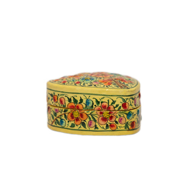 Decorative heart-shaped box with floral patterns