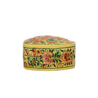 Decorative heart-shaped box with floral patterns