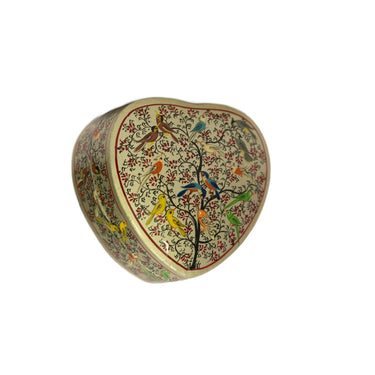 Decorative heart-shaped box with floral patterns