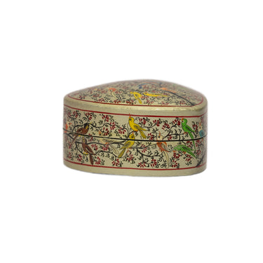Decorative heart-shaped box with floral patterns