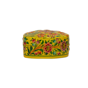 Decorative heart-shaped box with floral patterns