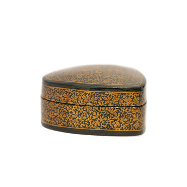 Decorative heart-shaped box with floral patterns