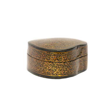 Decorative heart-shaped box with floral patterns