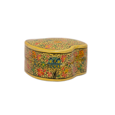 Decorative heart-shaped box with floral patterns