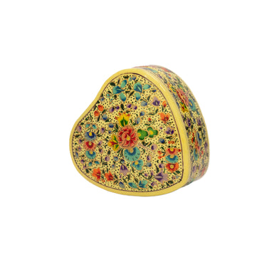 Decorative heart-shaped box with floral patterns
