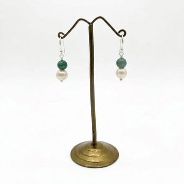dangle earrings st silver hook with a round jade bead above white pearl.