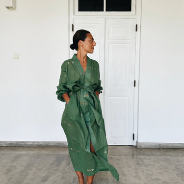  loose, long-sleeved green tie-front dress with small scattered light-colored speckles jamdani merchant campbell
