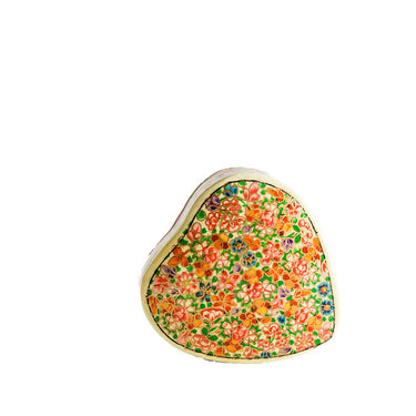 Decorative heart-shaped object with floral patterns