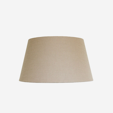 tapered drum lampshade in a textured beige fabric
